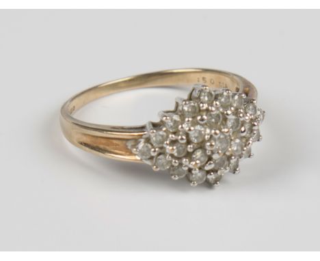 A 9ct gold and diamond marquise shaped cluster ring, claw set with circular cut diamonds, detailed '.50 DIA', weight 2.8g, ri