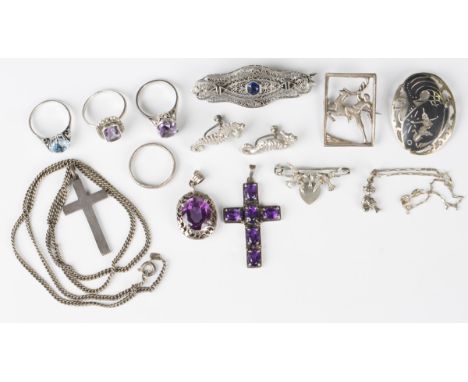 A silver and amethyst pendant cross, detailed 'Silver', weight 6.4g, length 4.8cm, a synthetic colour change corundum oval pe