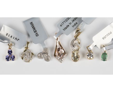 A 9ct white gold and diamond pendant, designed as a trefoil, with a Gemporia certificate card, and six further 9ct gold and g