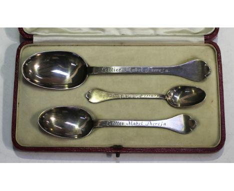 A matched set of three George V silver graduated trefid christening spoons comprising two London 1916, one by Francis Higgins