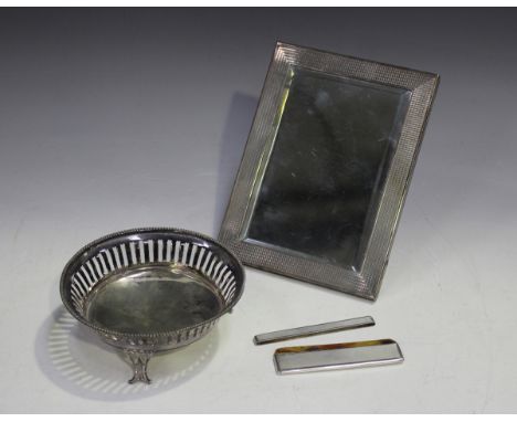 A George V silver mounted engine turned rectangular dressing table mirror, Birmingham 1928 by Deykin &amp; Harrison, height 1