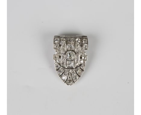 A diamond set dress clip, circa 1920, mounted with cushion cut and rose cut diamonds, unmarked, width 2.1cm, length 3.1cm, wi