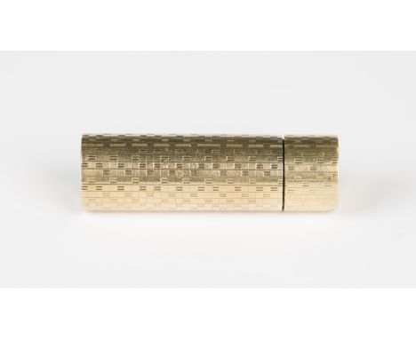 A Cartier London 9ct gold cylindrical screw topped scent bottle with engine turned decoration, detailed 'Barbara T', London 1