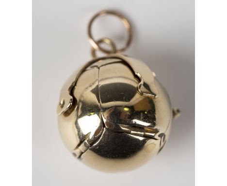 A 9ct gold and silver gilt Masonic folding spherical fob, opening to reveal engraved Masonic symbols, Birmingham 1982, weight