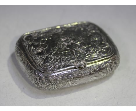 A late 19th century Dutch silver snuff box of curved rectangular form, the hinged lid decorated in relief with a couple in a 