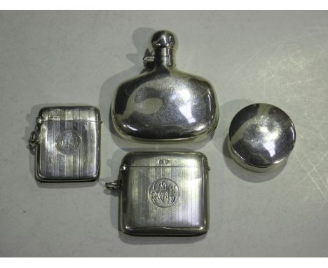 A small group of silver items, comprising a spirit flask, Birmingham 1901, two rectangular vesta cases, Birmingham 1911 and C