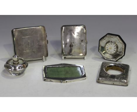 A late Victorian silver curved rectangular cigarette case, Birmingham 1899 by Henry Matthews, length 8.5cm, and another simil