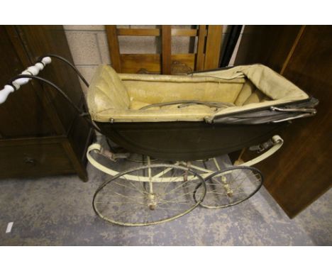 Victorian coach-built pram with ceramic handles