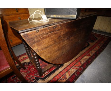 Large antique oak bobbin turned gate leg table