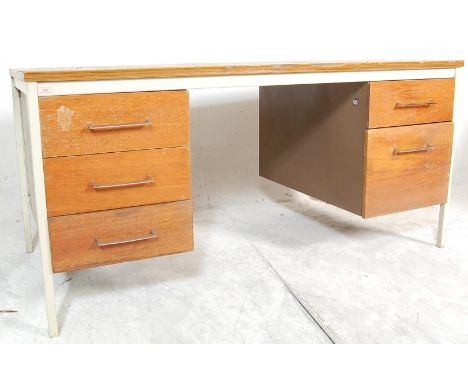 A vintage mid century factory industrial desk pedestal desk by Roneo Vickers. The desk having tubular metal frame painted in 