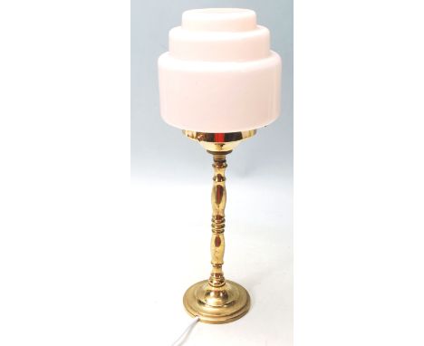 A vintage 1930’s Art Deco lamp / desk lamp / table lamp having a three step pink shade of a cylindrical form, brass turned co