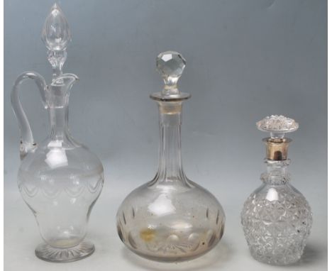 A silver hallmarked collar facet cut glass decanter, Birmingham hallmarks by Joseph Gloucester &amp; Sons. Together with an a