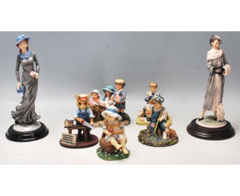 A collection of six vintage “ The Leonardo Collection “ ceramic figurines to include: A good Catch by Christine Haworth, Cart