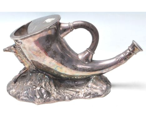 A vintage 20th Century novelty silver plated spoon warmer in the from of a hunting horn with a support in the form of a deer 