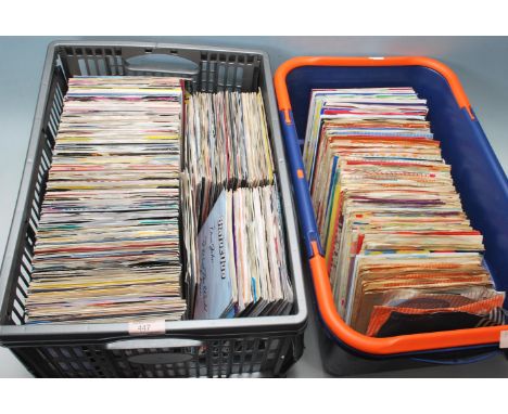 A large collection of vintage vinyl singles form the 1980s and 1990s to include George Michael, Michael Jackson, Statue Quo, 