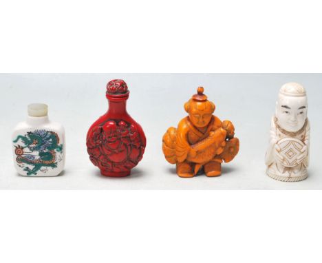 A collection of Chinese snuff / perfume bottles. To include a cinnabar effect bottle, ivory type perfume bottle carved in the