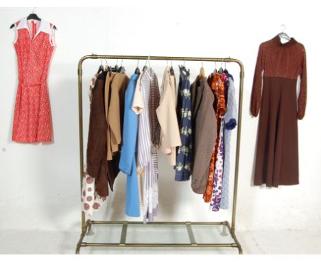 A large collection of vintage retro ladies clothing items from the 1960s &amp; 1970s of varying styles to include a ladies du