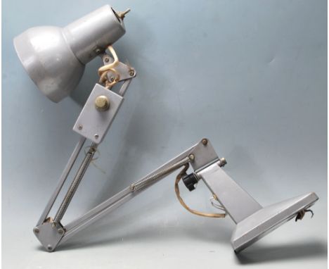 A mid 20th Century retro vintage industrial factory work lamp desk light having a wall mount with three arm articulated neck.