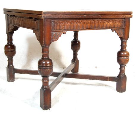 A vintage antique 20th century style&nbsp; Jacobean revival dark oak old charm extending refectory dining table. The table ha