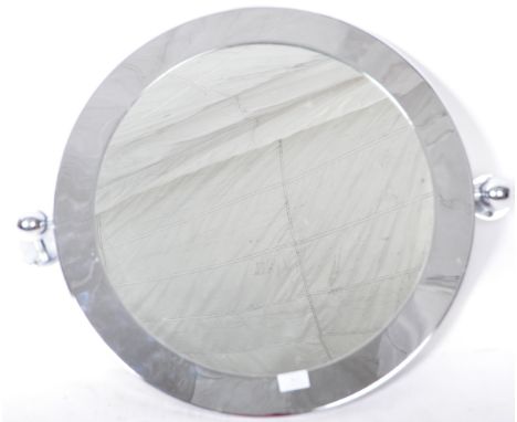 A good 20th Century retro vintage wall mounting pivotal mirror of chrome construction. The mirror of circular form having two
