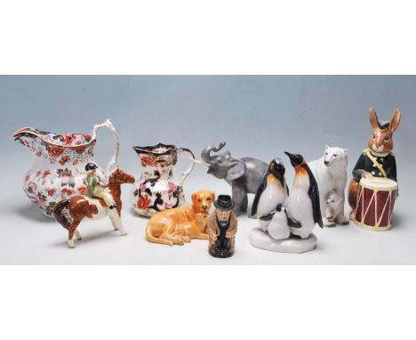 A collection of late 20th century ceramics to include a Royal Doulton Bunnybank, Labradors, Winston Churchill, Beswick Horse 