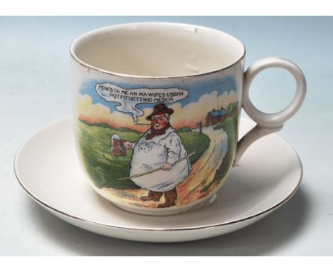 A large early 1900's Victorian Tykes Motto Teacup and Saucer, stamped 'Trade Mark Tyke B&amp;K Ltd' to bases. Diameter: 20 cm