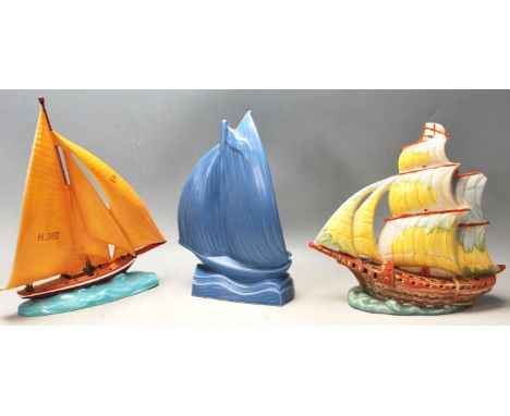 A group of three vintage 20th century studio art pottery boats. Two Czechoslovakian hand painted in bright colours and pierce