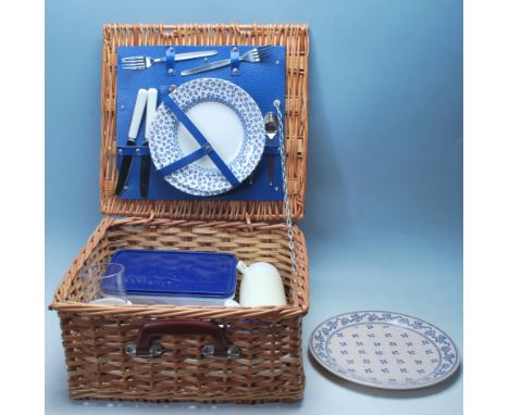 A vintage retro picnic basket hamper to include a&nbsp; floral Laura Ashley 'petite fleur' plate along with two others, two t