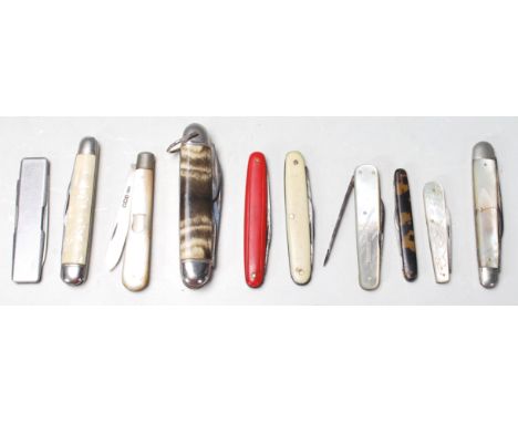 A collection of ten vintage 20th century fruit knives. Two knives having silver hallmarked blades for Sheffield 1919 by&nbsp;