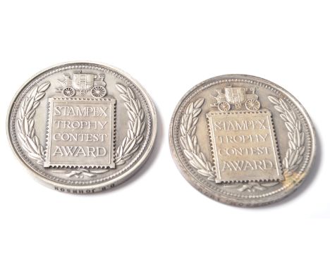 Two vintage 20th century white metal medal / coin for the Stampex Trophy Contest Award, named to M. B. JOHNSON 1972 and D. B.