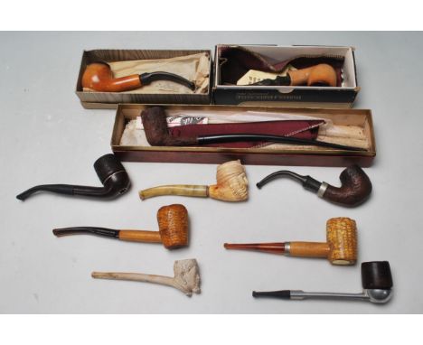 Tobacciana - A collection of mid 20th century vintage carved pipes to include brands such as Peterson, Parker and Hardcastle,