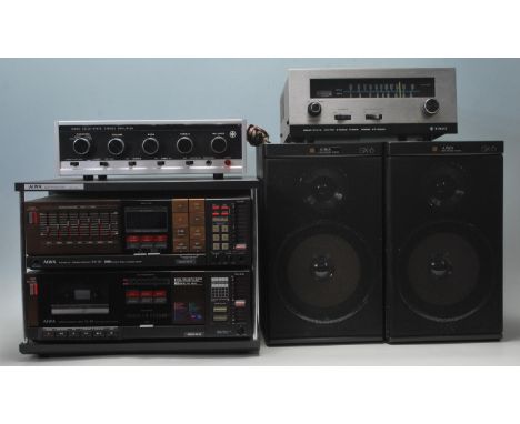 A vintage 20th century Nikki Solid - State Stereo Amplifier with metal case along with a Trio solid state AM-FM stereo tuner 