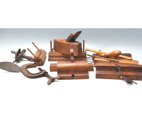 A collection of vintage&nbsp; early to mid 20th century woodworking tools. The collection consisting of planes, clamps, drill