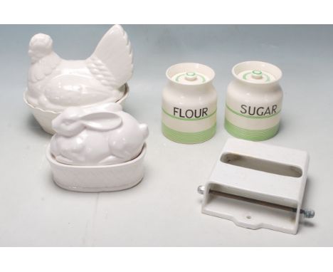 A group of retro 1920s ceramic household items of the Art Deco period to include a pair of egg baskets in the form of a hen a