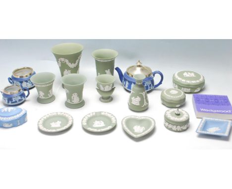 A collection of 20th century antique style Wedgwood Jasperware ceramic to include a plate, vases, pillboxes, teapot, etc. Mak