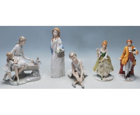 A collection of five late 20th ceramic figurines to include a seated ballerina by Nao for Lladro, a&nbsp;woman carrying flowe