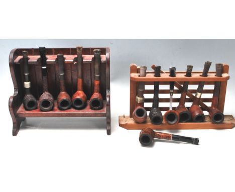 A collection of twelve vintage 20th century smokers pipes tobacciana having wooden shanks and bone &nbsp;stems. To include Pe