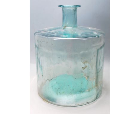 A vintage early 20th century industrial factory large green glass acid carboy bottle / eastern European glass olive bottle &n