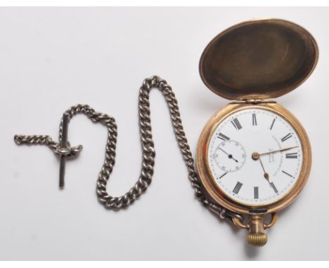 An early 20th century gold plated pocket watches, having white enamel face with Roman numeral chapter ring, faceted hands and