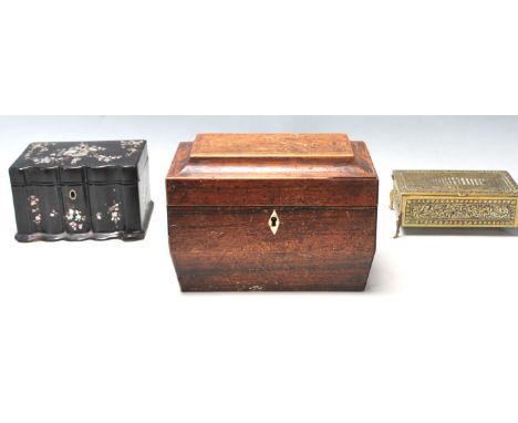 A group of three antique boxes to include a wooden tea caddy of sarcophagus form having a diamond shaped escutcheon to the fr