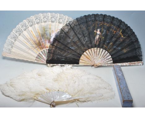 A collection of three mid 20th Century ladies fans to include a a black lace and mother of pearl having fine decoration of a 