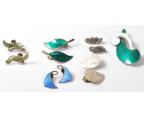 A collection of vintage Norwegian silver jewellery to include an Albert T Scharning enamelled brooch, a pair of David Anderse