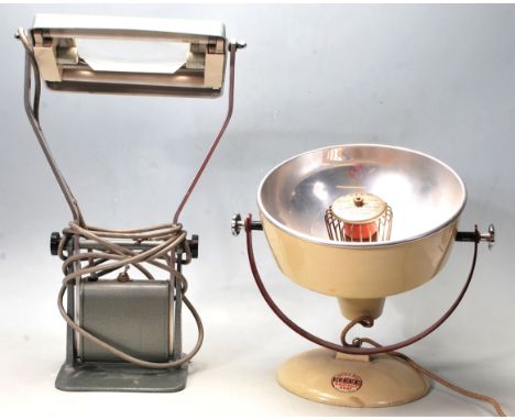 A vintage mid century I.V.A Engineering Co.LTD industrial desk lamp / worktop light having an enamelled light shade with magn