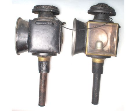 A pair of Victorian 19th Century brass and black painted horse carriage lamp lights. Both lanterns have original glass intact