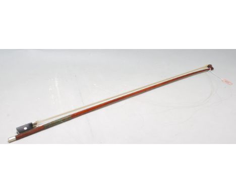 French nickel mounted J.T.L. violin bow stamped Sarasate EL, the stick round, the ebony frog inlaid with pearl eyes and the e