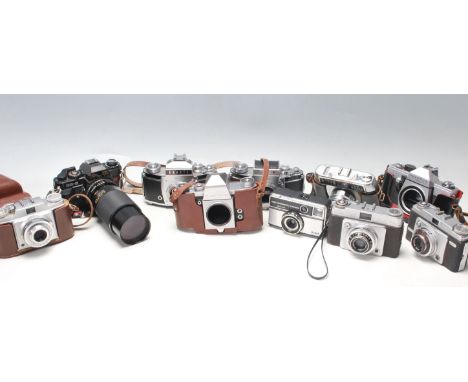 A large collection of 35mm cameras / photographs cameras to include Praktica IV F, Exakta Varex II b, Ilford Sportsman x2, Ag