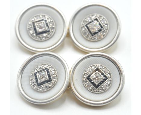 A pair of vintage gentleman's 18ct gold cufflinks having round heads being set with round cut diamonds and onyx within a geom