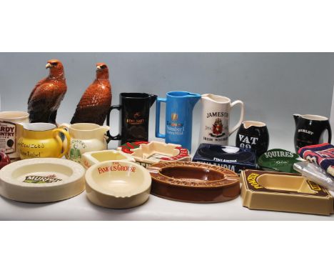 A large collection of vintage retro pub advertising ashtrays, jugs, pump mounts and bar towels. The collection contains brand