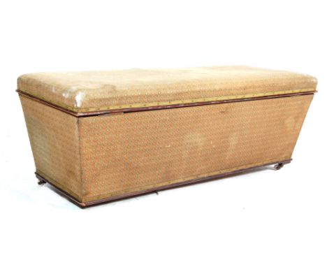 A 19th Century pine William IV / Victorian ottoman / blanket box / footstool of sarcophagus form having a hinged lid with pad