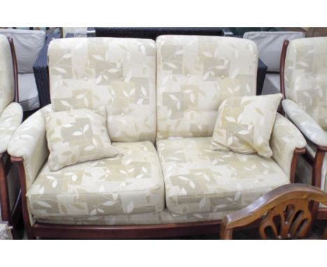 An Ercol wood framed 2 seater settee 3 piece lounge suite in gold pattern covering with loose cushions 
